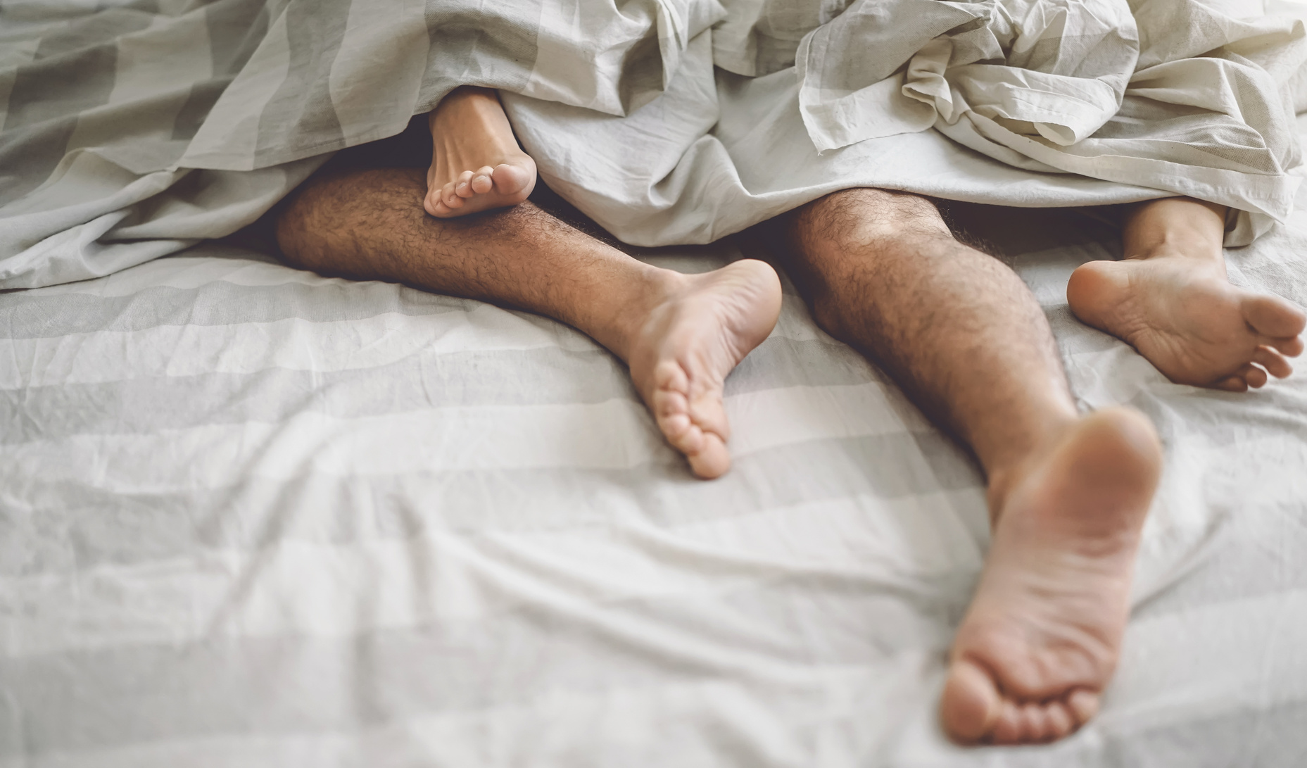 Couple Lying in Bed